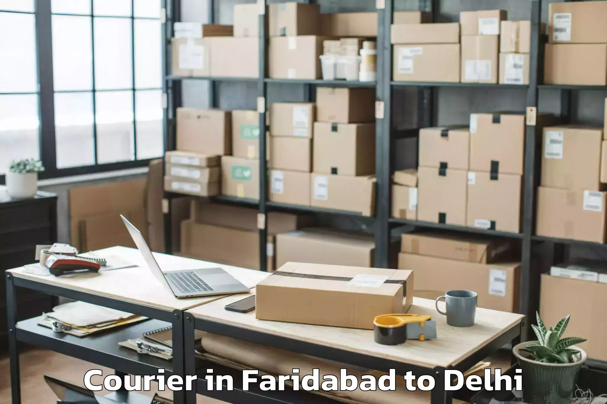 Book Faridabad to Omaxe Connaught Place Courier Online